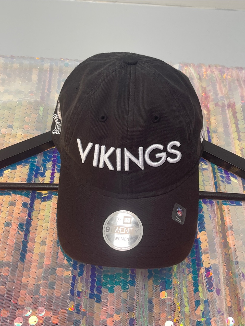 New Era Black Baseball Cap with White Embroidery